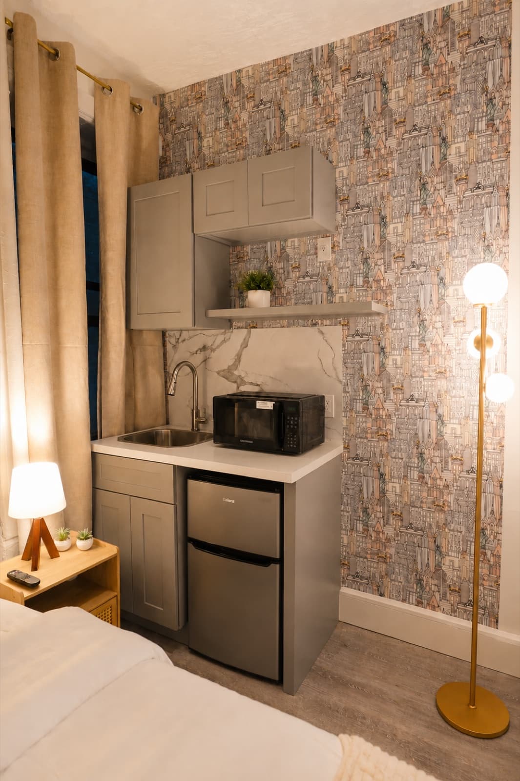 Private furnished room at Amsterdam Place, Upper West Side NYC — kitchenette with sink, microwave, and mini-fridge