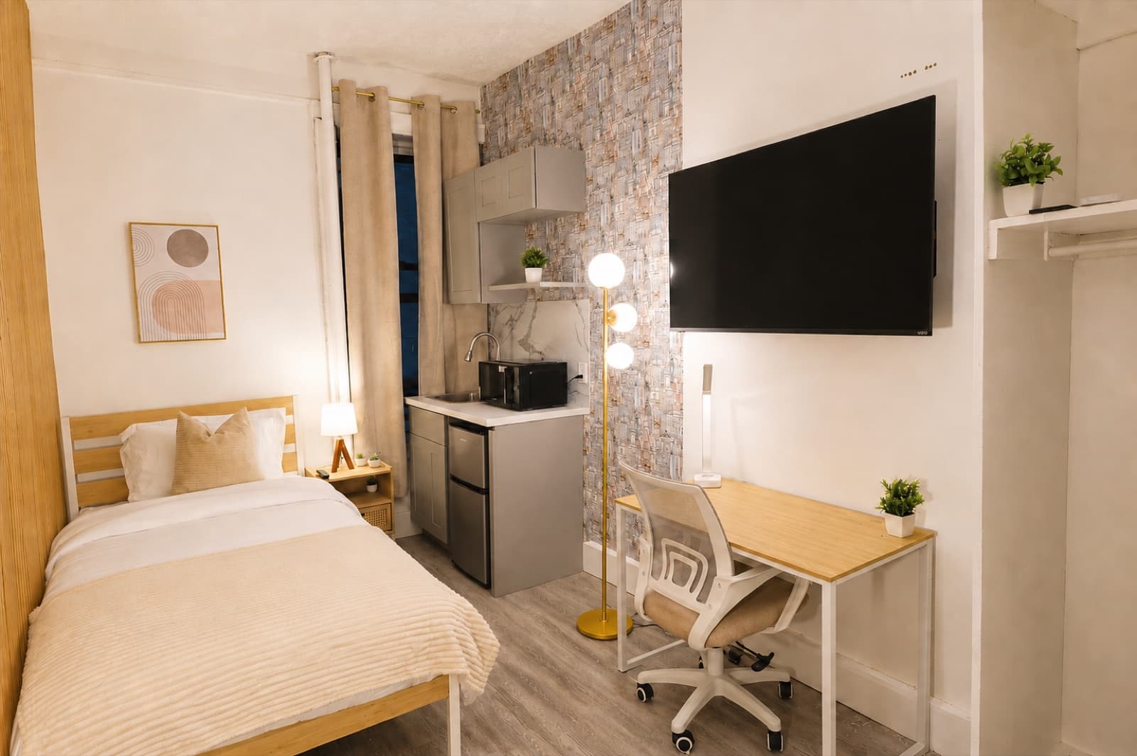 Private furnished room at Amsterdam Place, Upper West Side NYC — full private room with bed, workspace, and wall-mounted TV